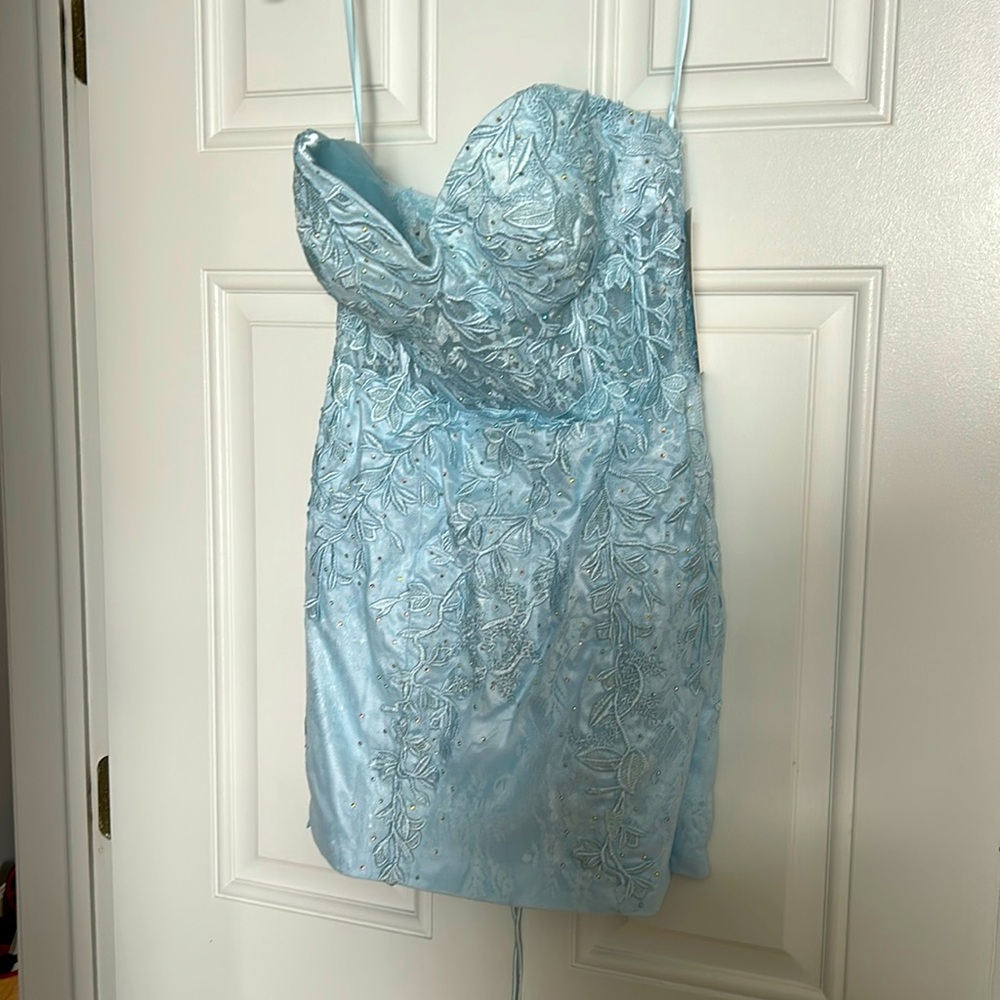 appliqué corset bodice  detailed gems for a a subtle sparkle a lace up back